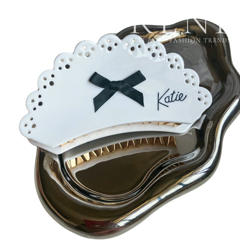 Wholesale Sweet and Cool Bow Hollow Letter Clip